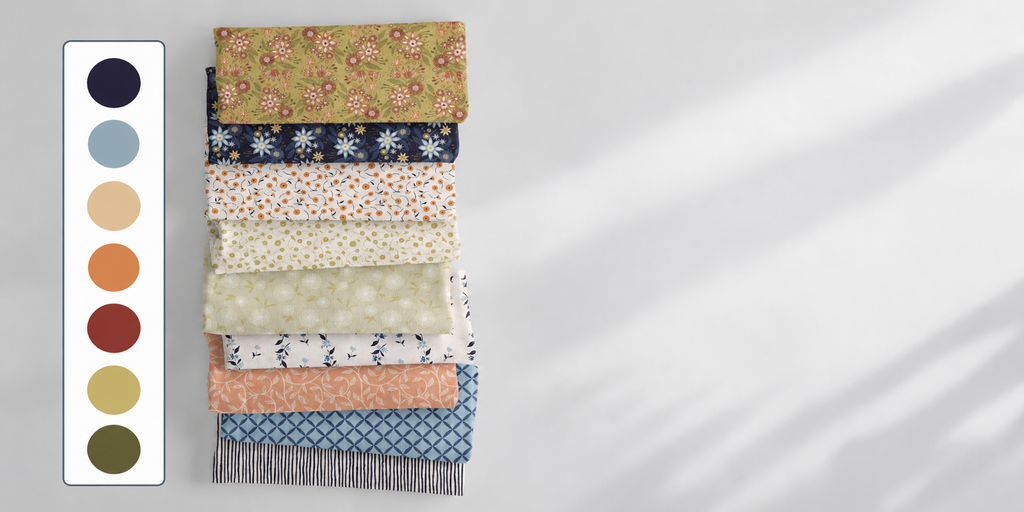Botanical Reverie Heritage Garden hand-painted pattern collection fabrics in earthy green, navy, terracotta and warm neutral tones.