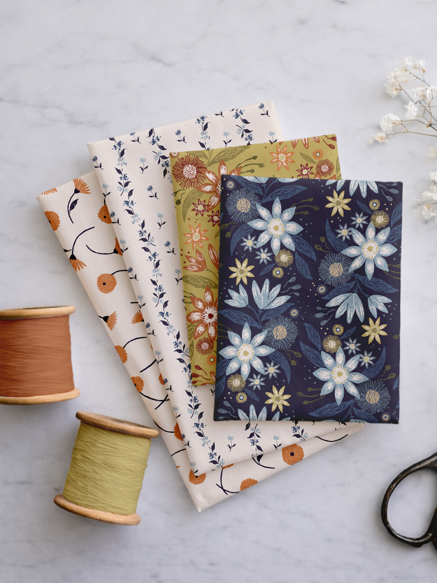 Selection of Botanical Reverie fabrics in the Heritage Garden colorway, showcasing coordinating floral, botanical, geometric and striped patterns.