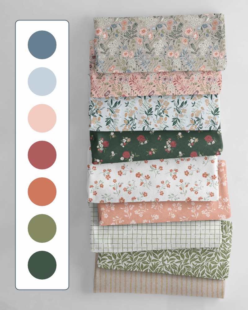 Floral Whisper Vintage Bloom colourway with warm coral, dusty blue, sage green and botanical fabric patterns